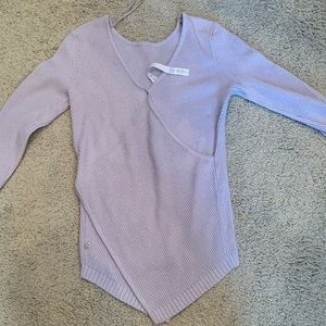 Size 4 Lululemon Lilac sweater. It’s a little tight on me 😏